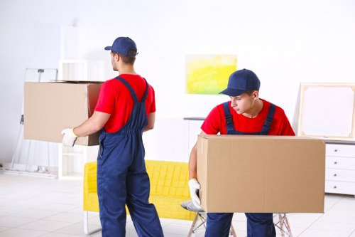 Professional man and van service in Liverpool loading furniture